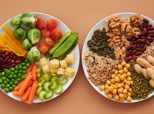 A vibrant flatlay of colorful vegetables and nuts showcasing a balanced diet concept.